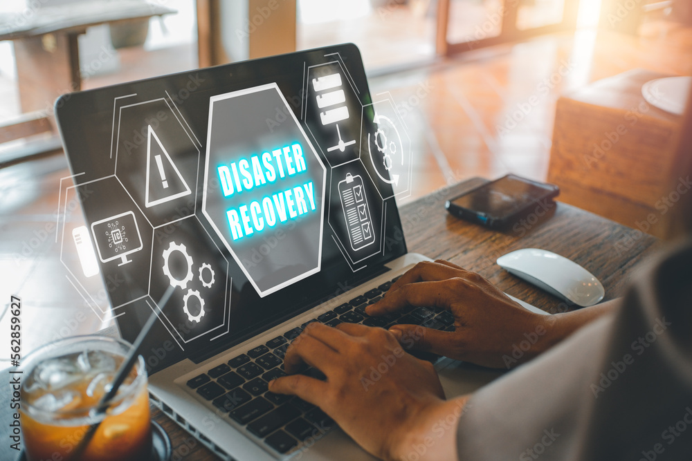Poster disaster recovery concept, person hand using laptop computer with disaster recovery icon on virtual 