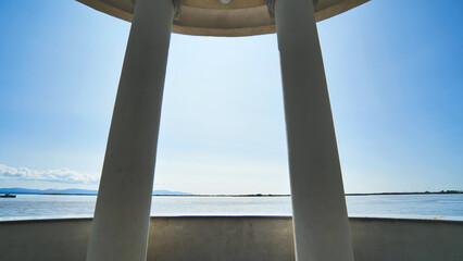 White rotundas in the city near the waterfront.