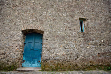 Detail of door and church wall dated 1761 in colonial city of Itanhaem, coast of Sao Paulo state, Brazil