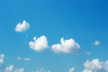 Blank sky surface with small clouds