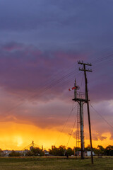 railway signal with impressive stormy sky at sunset. vertical format