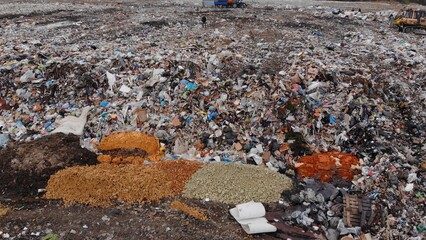 Large landfill near the metropolis in autumn.