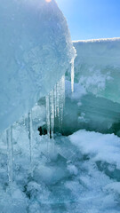 Naklejka na ściany i meble ice blocks on the frozen sea in the sun