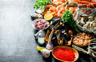 Assortment of different seafood with garlic, herbs and spices.