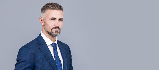 mature man with grizzled hair in formal suit copy space, formal. Man face portrait, banner with...
