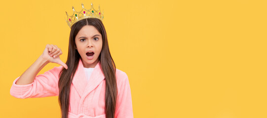 egoistic teen girl in home terry bathrobe and princess crown, egoism. Child queen princess in crown horizontal poster design. Banner header, copy space. - obrazy, fototapety, plakaty