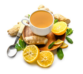 Wooden board with cup of tea, ginger, lemon and mint on white background