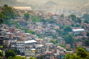 Buildings of Favela or Communinity Santa Marta mountain behind in Rio de Janeiro, Brazil.