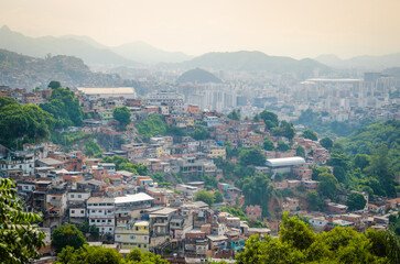 Fototapeta na wymiar Buildings of Favela or Communinity Santa Marta mountain behind in Rio de Janeiro, Brazil.