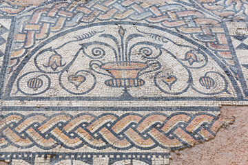 Original Roman mosaic at teh Roman Theatre of Orange and Triumphal Arch of Orange, France
