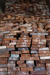 Piles of  wood lumber in wood shop different size options, for wood working project , house construction, furniture supplies, at Pracha narumitr community of woods material in Bangkok ,Thailand