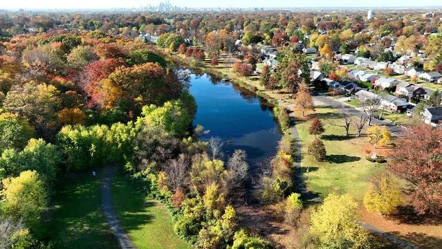 Aerial View of a Lake and  Trees in Fall Colors