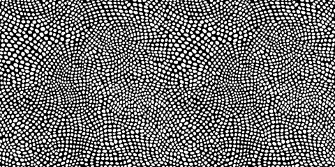 Seamless hand drawn small dense polkadot animal spots pattern in white on black background. Abstract aboriginal dot art motif or organic cellular texture in a trendy doodle line art or linocut style.