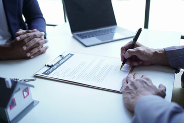 Businessman discussing commercial real estate sector faces risks as financial.