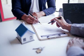 Businessman discussing commercial real estate sector faces risks as financial.