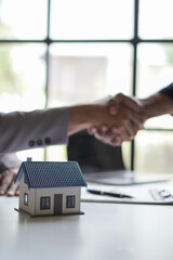 Businessman discussing commercial real estate sector faces risks as financial.