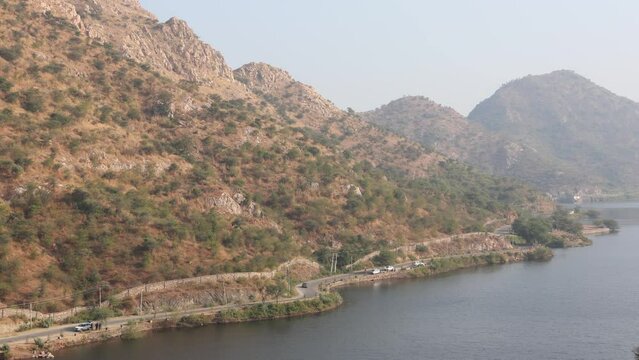 Bahubali Hills, Udaipur, Rajasthan, India 28th December 2022: Popular prewedding destination and trekking spot near Udaipur. View of Bahubali hill and Badi lake near Barda village