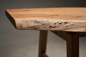 Wooden table with curved natural edge