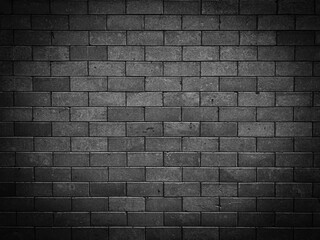 Old vintage retro style dark bricks wall for abstract brick background and texture.	