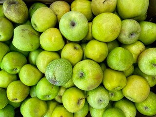 Green apples photographed from above. Lots of green apples.