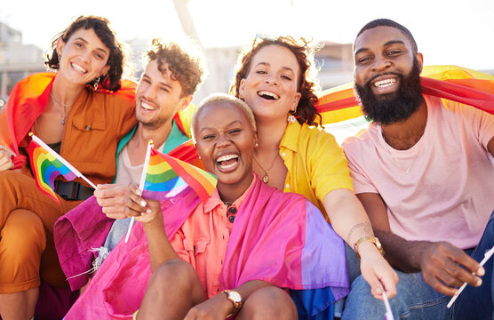 Portrait, diversity and rainbow flag for lgbtq community, freedom and smile for parade, support or solidarity. Friends, group or young people with non-binary, gay and lesbian with happiness and queer