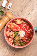 Red Sauce Noodle Soup called Yentafo Noodle, a popular Thai dish.