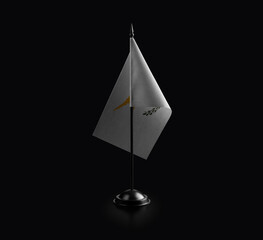 Small national flag of the Cyprus on a black background
