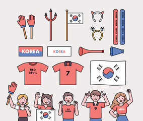 Fototapeta na wymiar Korea's soccer cheering team Red Devils supporters. Supporting items and fans cheering.