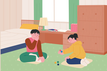 Korean childhood games. Children sitting in the room and playing the five stone game.