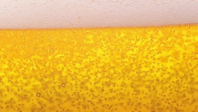 Close up to glass of beer bubbles foam. 