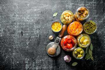 Obraz na płótnie Canvas Pickled food in glass jars.