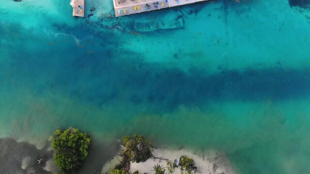 Tropical Island Drone Footage. Caye Caulker in Belize. Aerial Drone of Paradisiac Island.
