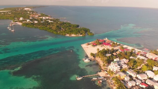 Tropical Island Drone Footage. Caye Caulker in Belize. Aerial Drone of Paradisiac Island.