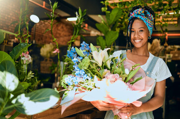 Black woman with bouquet, flowers and florist in greenhouse, small business owner and smile in...