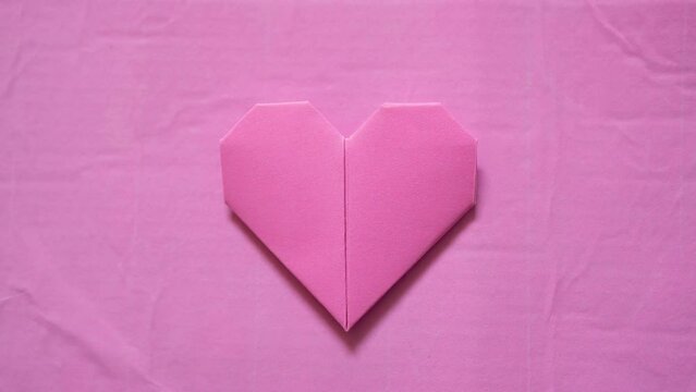 Paper heart beating in fast pace