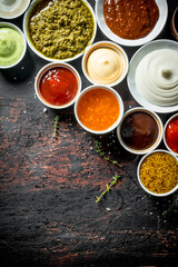 Different types of sauces in bowls.