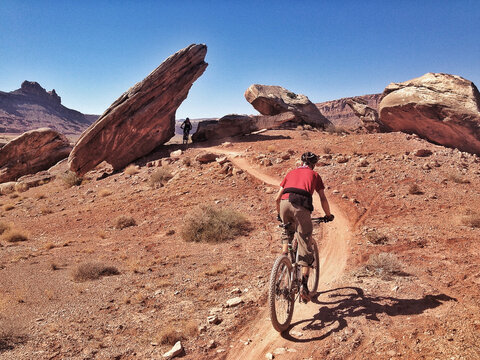 Mountain bikers on the Bar-M trails, Moab, Utah.
PLEASE NOTE: This image is part of Aurora's myPhone Collection of images taken with mobile devices. Available file sizes vary, and 