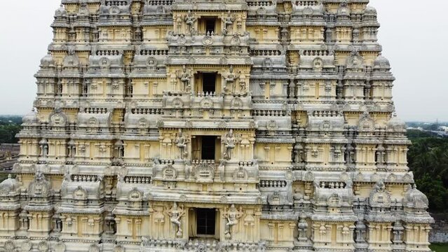 Aerial view of Sri Kanchi Kamakshi Amman Temple in Kanchipuram, Tamil Nadu. Close-up of temple tower with beautiful God, and animal sculptures which are carved and sculpted mostly out of sandstone.