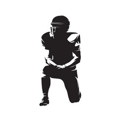 American football player kneeling, isolated vector silhouette