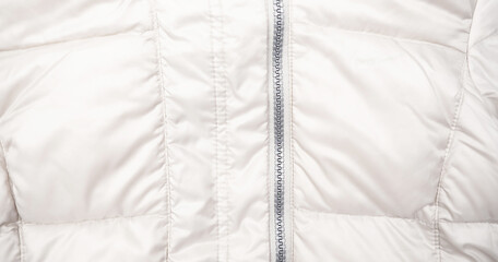 Part of the jacket, a down jacket with a zipper. The jacket is overshadowed, winter, spring. Women's, youth clothing.