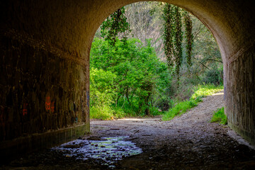 Tunnel under the railway tracks, part of a rural road in Spain.