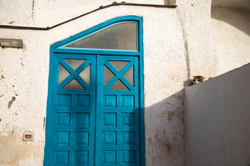 Colorful houses and tiny narrow streets on Procida Island, Italy.