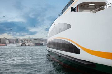 Ferry floats on the way to Bosphorus on the background of Istanbul
