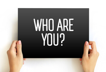 Who Are You question text on card, concept background
