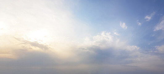 Naklejka na ściany i meble Sunny blue sky backgrond with clouds. Panorama photo
