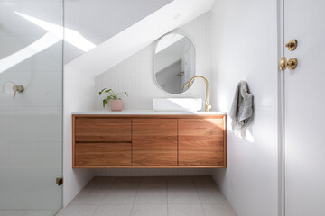 Modern white bathroom stone benchtop timber vanity gold brass tap sink mirror tiled wall elegant...