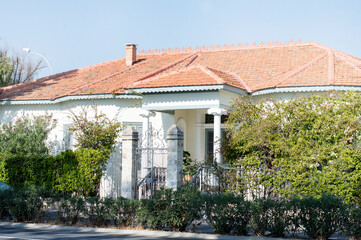 Large village house with granite stone in the yard