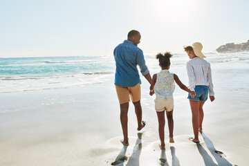 Black family, beach and walk during summer on vacation or holiday relaxing and enjoying peaceful...