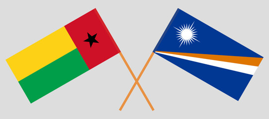 Crossed flags of Guinea-Bissau and Marshall Islands. Official colors. Correct proportion