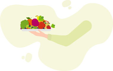 Vegetarian diet concept - hand holding a plate with vegetables and fruits.Veganuary is an annual challenge that encourages people to follow a vegan lifestyle